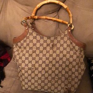 Gucci shoulder bag has some signs of wear as shown in picture